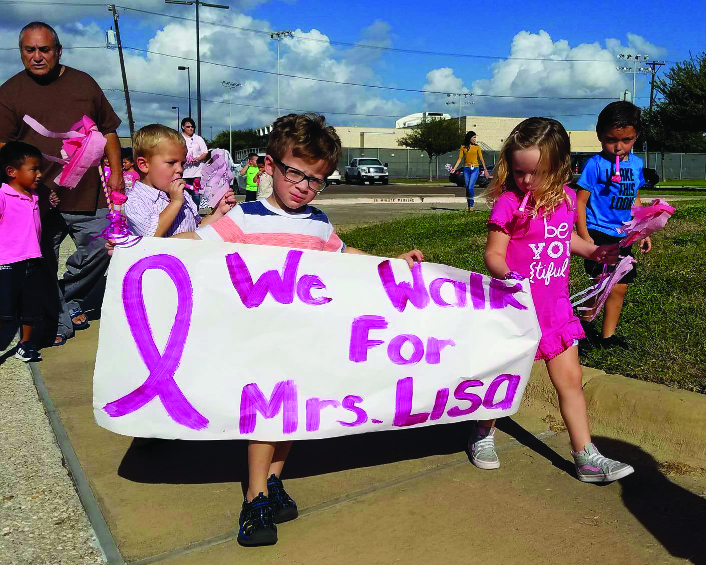 Students march against cancer to honor teacher