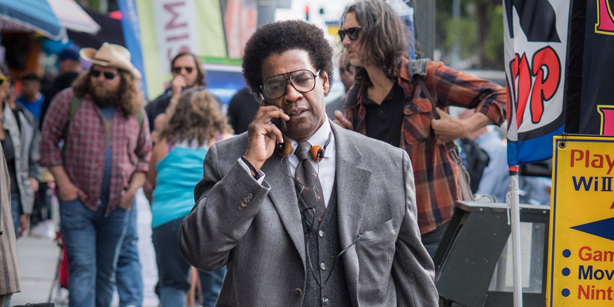 Denzel shines as a liberal hero in dragging film