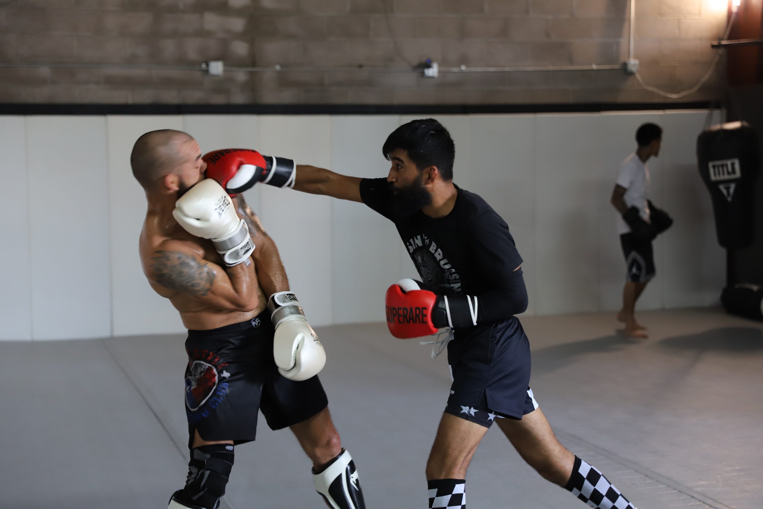 Green Lands A Solid Punch During A Sparring Session With Santos.