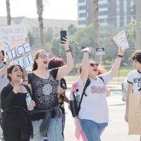 Ray High School students march down Shoreline Boulevard in protest of ICE. Hundreds of CCISD high school students walked out of school in protest on Feb. 12.