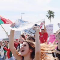 King High School student Khelsy E. Hernandez protests ICE with peers outside La Palmera mall. Hernandez was one of hundreds of students from CCISD high schools who walked out of classes at 1 p.m. Thursday, Feb. 12 to protest ICE prescence in their community.