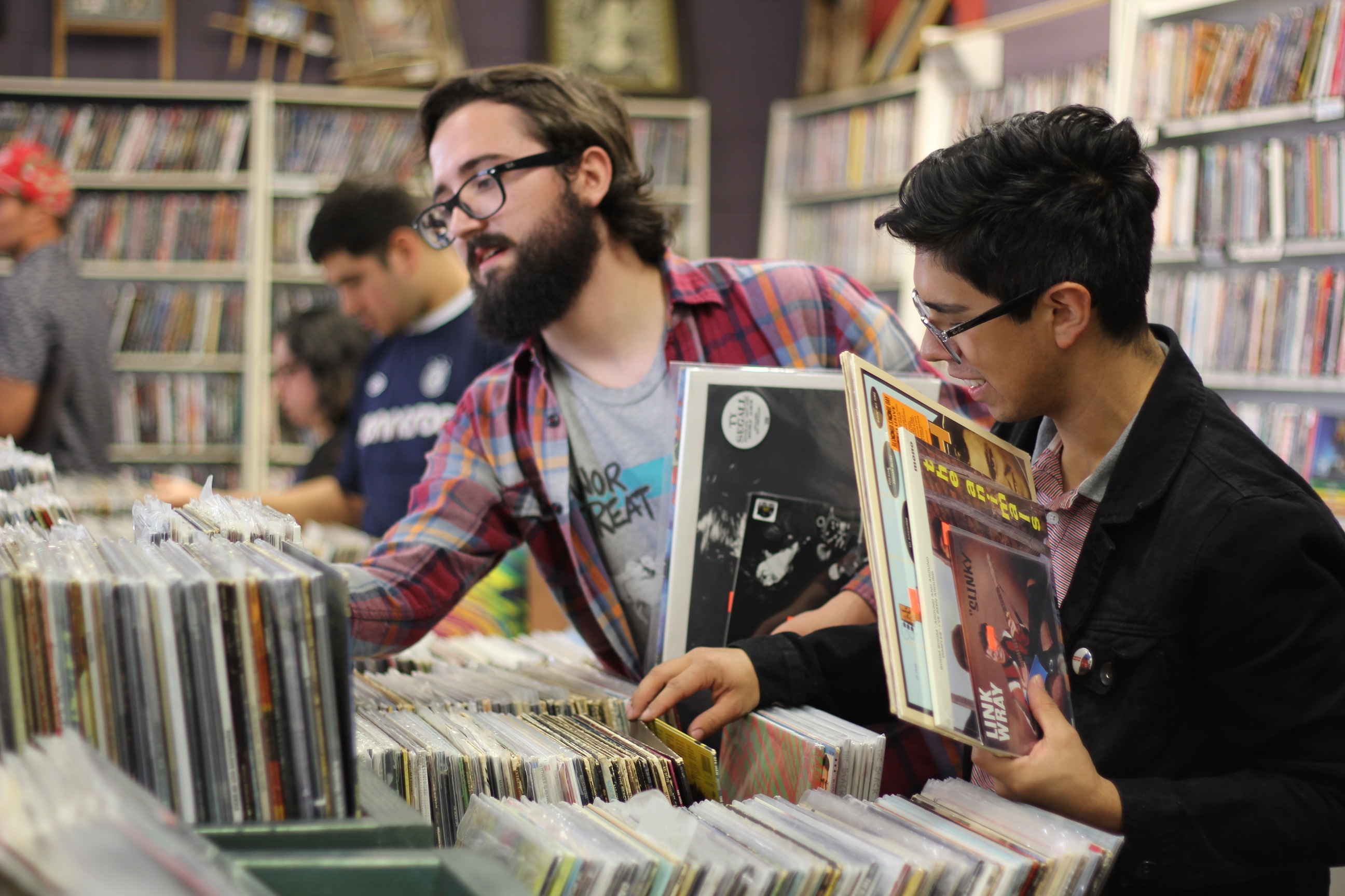Mason Shirley (left) and Joshua DeLeon browse through the records at Disc Go Round on Record Store Day.