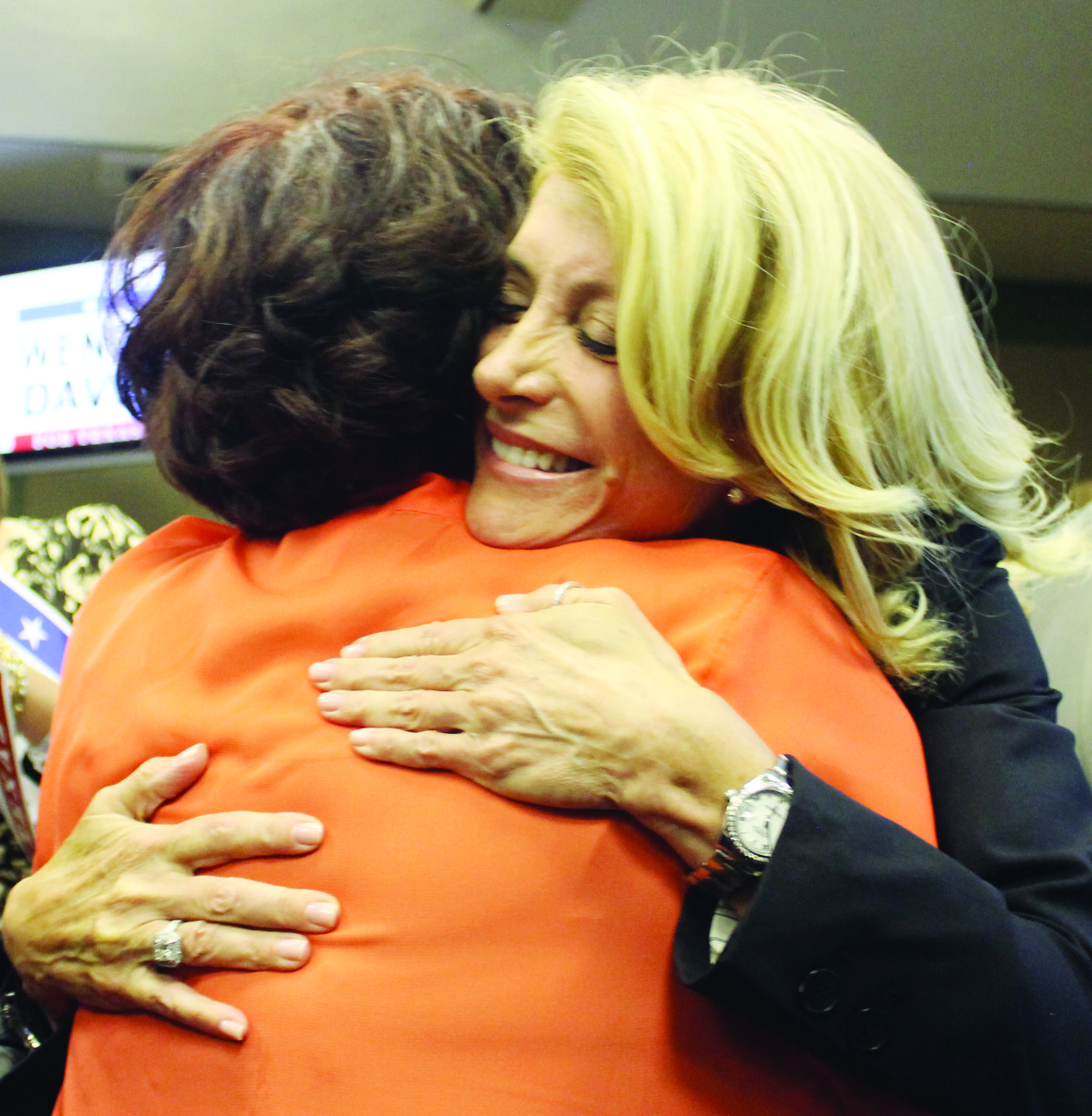 Wendy Davis hugs Sylvia Campos who works for Battleground Texas.