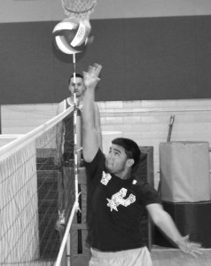 Rudy Trevino, Diglets, extends his reach to deflect the ball.
