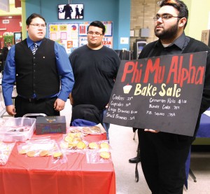Phi Mu Alpha members conduct a bake sale to raise money during the Spring Break Bash on March 11 in the Harvin Center on East Campus. The event also featured live music and other entertainment.