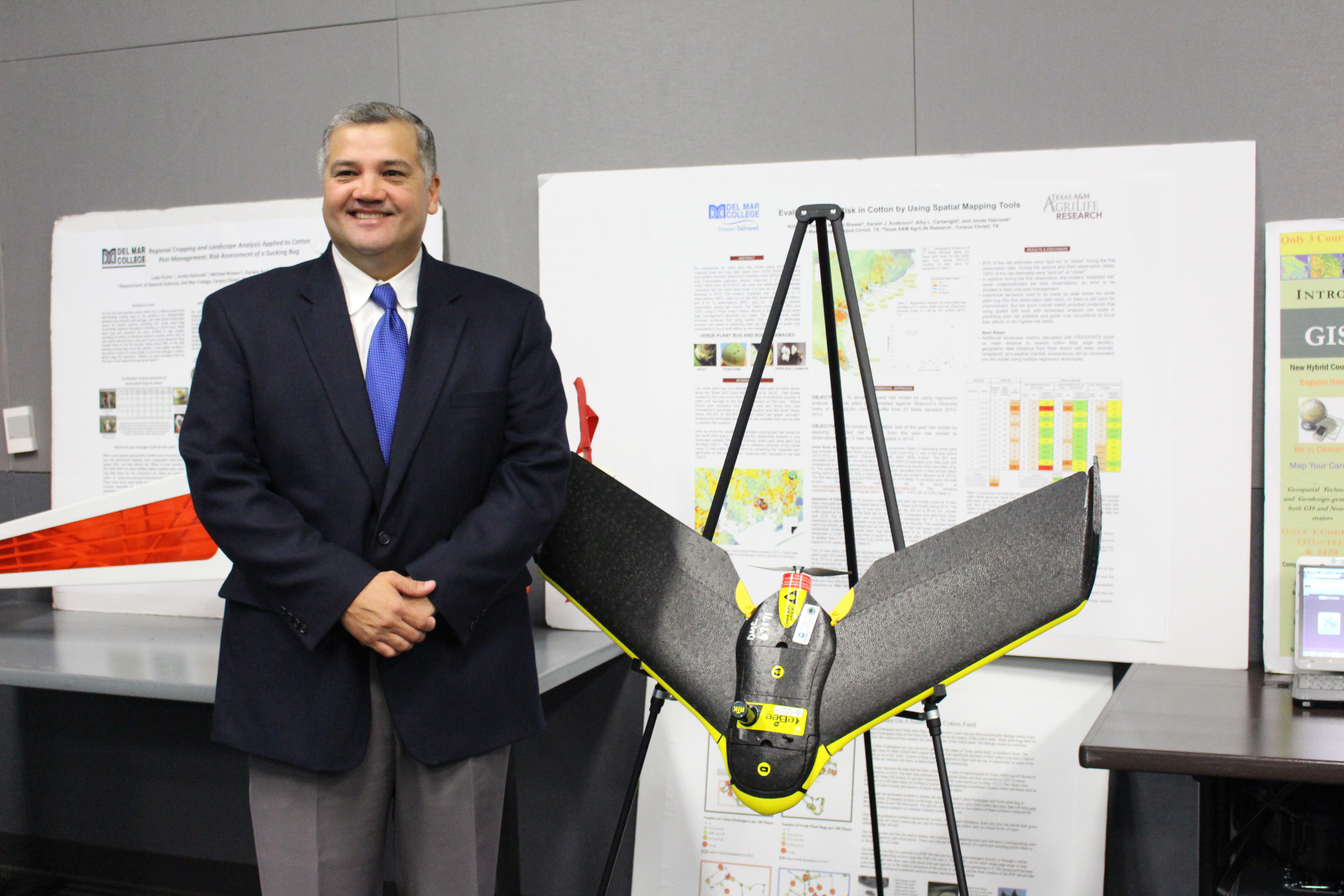 President Mark Escamilla stands next to Del Mar’s GIS drone at the event.