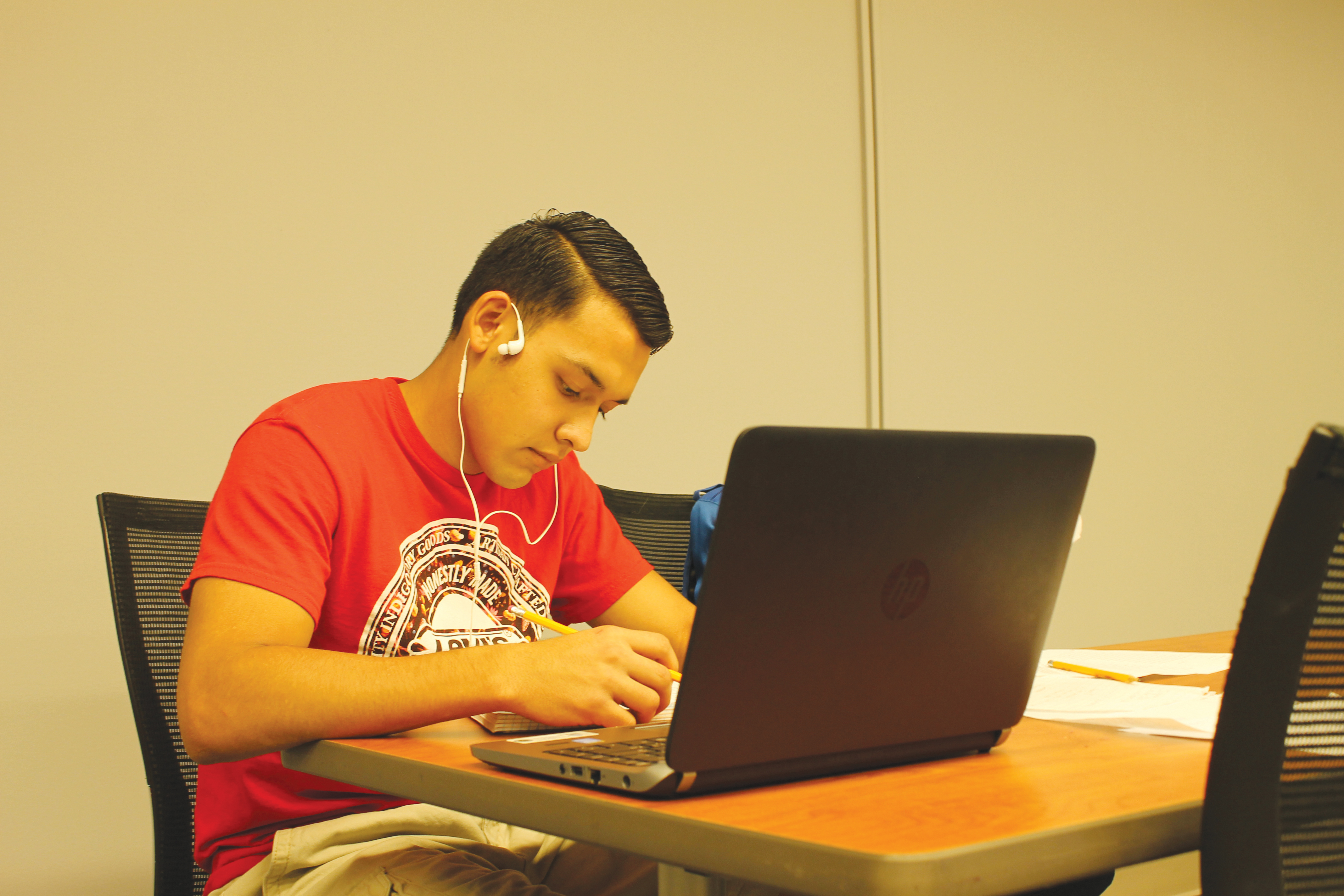 Jay Cantu brainstorms his next essay for his English class while taking advantage of the peace and quiet in the SWC.