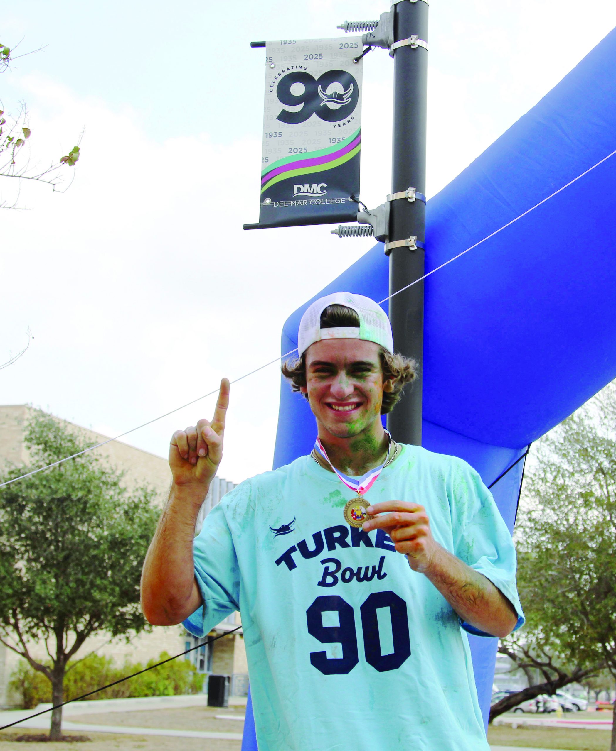 Revel Wicks Celebrates With His New Medal And Shirt After Being The First Student To Finish The Fall 2025 Color Run Hosted By Intramural Sports On Wednesday Nov. 19 At The Heritage Campus. Wicks Enjoys Any Event On Campus That Allows Him To Stay Active.