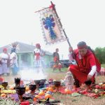 Sanadora Alicia Hernandez adds incense to a ceremonial burner during the ceremony, which must remain lit for the duration of the danza.