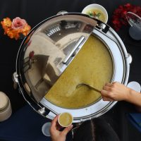 Gallery 41 table preparing servings for SOUPer bowl attendees