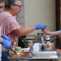 Sojourners table serving souper bowl attendees