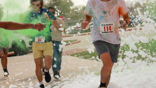 Runners get hit with color and foam at the Color Run on March 4. Photo by Victor Herrera